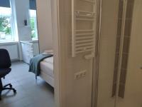 Posteľ alebo postele v izbe v ubytovaní 1210Apartment