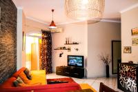TV a/nebo společenská místnost v ubytování Desert Pearl Apartment