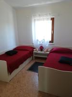 Posteľ alebo postele v izbe v ubytovaní Casa ValeLuna Rovinj