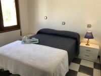 Posteľ alebo postele v izbe v ubytovaní MEDDAYS VILLA LAGUN ETXEA