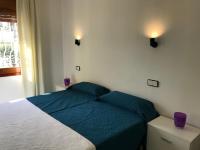 Posteľ alebo postele v izbe v ubytovaní MEDDAYS VILLA LAGUN ETXEA