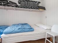Postel nebo postele na pokoji v ubytování 8 person holiday home in Sjølund-By Traum
