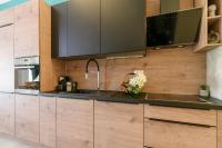 Kuchyňa alebo kuchynka v ubytovaní COZY APARTMENT