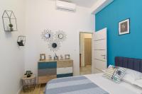Posteľ alebo postele v izbe v ubytovaní COZY APARTMENT