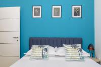 Posteľ alebo postele v izbe v ubytovaní COZY APARTMENT