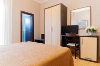 Posteľ alebo postele v izbe v ubytovaní Hotel Riviera