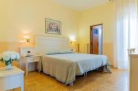 Posteľ alebo postele v izbe v ubytovaní Hotel Riviera