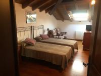 Postel nebo postele na pokoji v ubytování Casa Elena