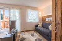 Televízia a/alebo spoločenská miestnosť v ubytovaní Apartment Roderer