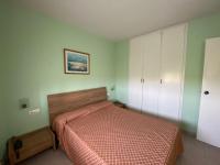 A bed or beds in a room at Apartamento cerca de playa