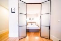 Postel nebo postele na pokoji v ubytování Morar Apartments Porto