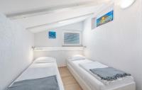 Posteľ alebo postele v izbe v ubytovaní Apartment Vilma Funtana