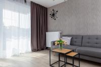 Część wypoczynkowa w obiekcie Modern City Center Apartments by Noclegi Renters