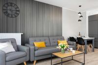Część wypoczynkowa w obiekcie Modern City Center Apartments by Noclegi Renters