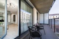 Balkon lub taras w obiekcie Modern City Center Apartments by Noclegi Renters