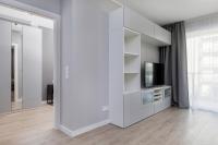 Telewizja i/lub zestaw kina domowego w obiekcie Modern City Center Apartments by Noclegi Renters