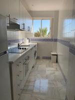 A kitchen or kitchenette at Fuentes de Nerja