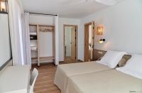 Posteľ alebo postele v izbe v ubytovaní Apartamentos Sabina Playa
