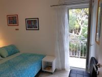 Postel nebo postele na pokoji v ubytování Apartments Kuzmanic