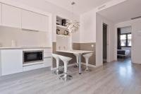 A kitchen or kitchenette at Habitat Apartments ADN