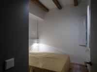 Postel nebo postele na pokoji v ubytování Villaroel · Modern flat in San Antoni