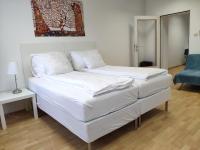 Posteľ alebo postele v izbe v ubytovaní 1210Apartment