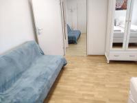 Posteľ alebo postele v izbe v ubytovaní 1210Apartment