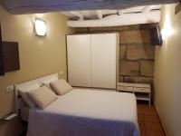 Postel nebo postele na pokoji v ubytování Aldea Rural A Cortiña