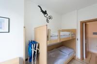Łóżko lub łóżka w pokoju w obiekcie Appartement Lago Blu