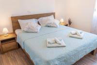 Posteľ alebo postele v izbe v ubytovaní Villa Umag Seafront