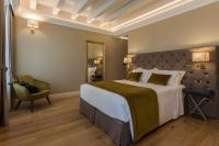 Posteľ alebo postele v izbe v ubytovaní Boutique Hotel Villa Zoppi - Adults only