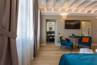 Televízia a/alebo spoločenská miestnosť v ubytovaní Boutique Hotel Villa Zoppi - Adults only