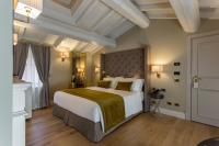 Posteľ alebo postele v izbe v ubytovaní Boutique Hotel Villa Zoppi - Adults only