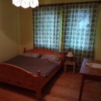Łóżko lub łóżka w pokoju w obiekcie Tulman Villa