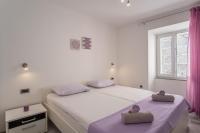 Posteľ alebo postele v izbe v ubytovaní Private Holliday Apartment