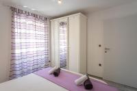 Posteľ alebo postele v izbe v ubytovaní Private Holliday Apartment