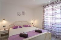 Posteľ alebo postele v izbe v ubytovaní Private Holliday Apartment