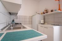 Kuchyňa alebo kuchynka v ubytovaní Private Holliday Apartment