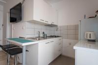Kuchyňa alebo kuchynka v ubytovaní Private Holliday Apartment