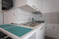 Kuchyňa alebo kuchynka v ubytovaní Private Holliday Apartment