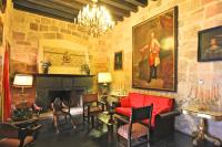 A seating area at Posada Real Castillo del Buen Amor