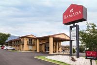 a sign in front of a hotel at Ramada by Wyndham Flagstaff East in Flagstaff