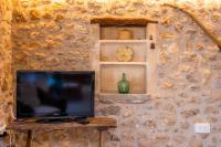 Telewizja i/lub zestaw kina domowego w obiekcie Finca Can Blai