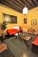 A seating area at Posada Real Castillo del Buen Amor