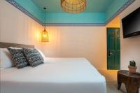 Ein Bett oder Betten in einem Zimmer der Unterkunft U Splash Resort Eilat
