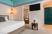 Ein Bett oder Betten in einem Zimmer der Unterkunft U Splash Resort Eilat