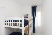 Postel nebo postele na pokoji v ubytování Santa Pola Apartments