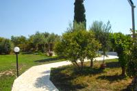 A garden outside VILLA GIUMMARITO B&B