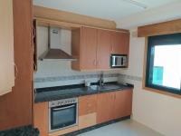 A kitchen or kitchenette at Apartamento XOSÈ Sanxenxo