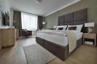 Postel nebo postele na pokoji v ubytování Apollo Hotel Bratislava